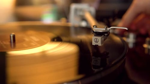 Vinyl Record Spinning on a Turntable Close Up
