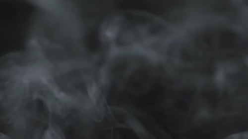 Swirling White Smoke on Dark Gray Background