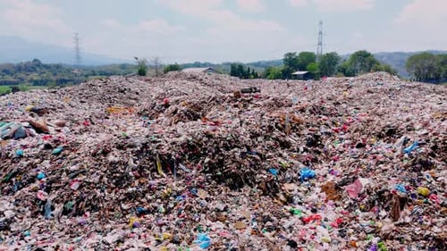 Massive Landfill of Trash and Debris on Rural Landscape