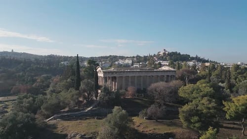 Ancient temple of Hephaestus in historical centre of Athens, Agora aerial panoramic footage
