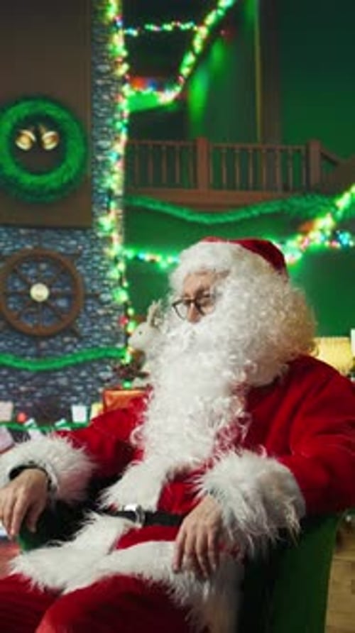 Vertical Video Santa Claus Waking Up From Sleep to Deliver Gifts to Children