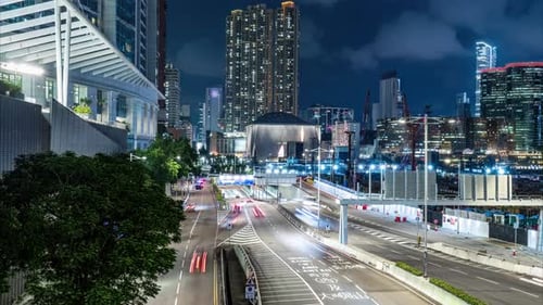 Time lapse of night view on Austin road and Xiqu Centre in Kowloon Hong Kong