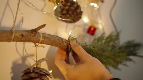 Hand Crafting Christmas Decoration with Pine Cones