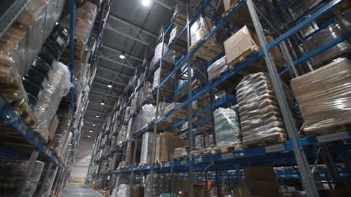 Efficient workflow at a large warehouse logistics terminal with palettes of goods