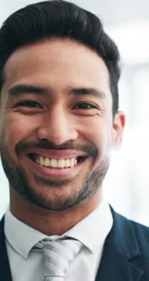 Smile, professional and face of business man in office for pride, confidence and corporate