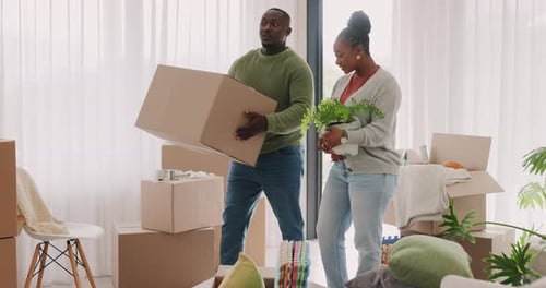 Moving in, happy couple and boxes at home for real estate and fresh start
