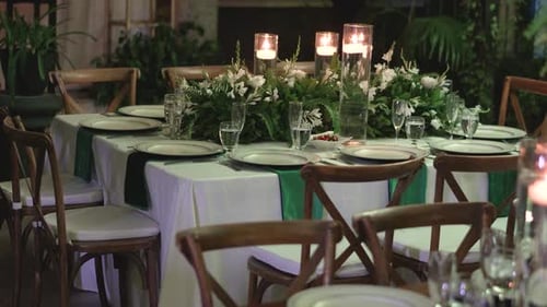 Elegant Wedding Reception Table Setting with Candles