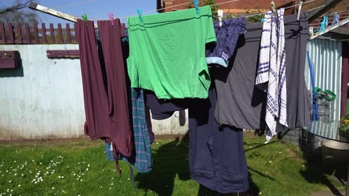 Clothes Hanging on Line on Sunny Day