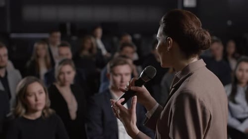 Speech of Female Teacher at Economy Conference or Summit Meet. Independent Speaker