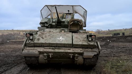 Ukraine's M2 Bradley: Adapted for CASEVAC missions and armored with a cage for drone defense.