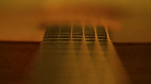 Acoustic guitar strings focus pull 4K