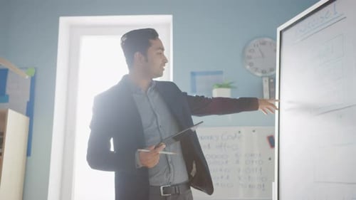 School Class: Portrait of the Enthusiastic and Motivated Teacher Using Digital Tablet Computer, Exp