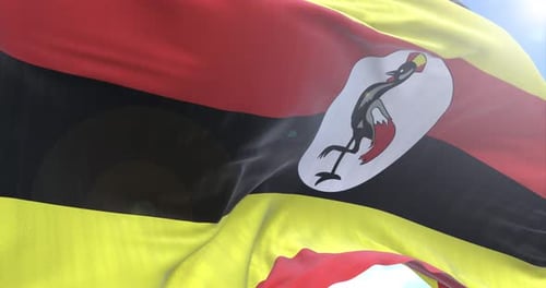 Realistic Waving Flag of Uganda on a Sunny Day