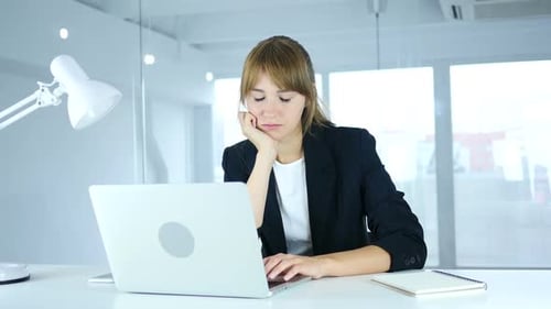 Young Female Sleeping at Work with Neck Pain Workload