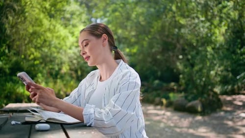 Cute Woman Answering Message Smartphone Sitting Nature Recreation Place Close Up