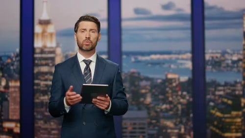 Bearded Anchor Man Talking at Newscast Multimedia Channel Close Up Daily News
