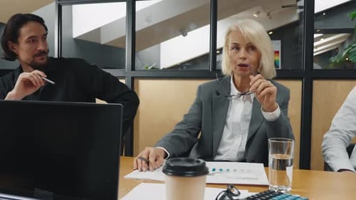 Business Meeting with Diverse Team in Modern Office