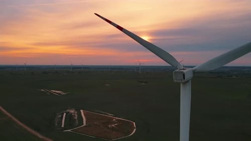 Wind Turbines on Wind Farm Field Generating Clean Renewable Energy for Sustainable Development at