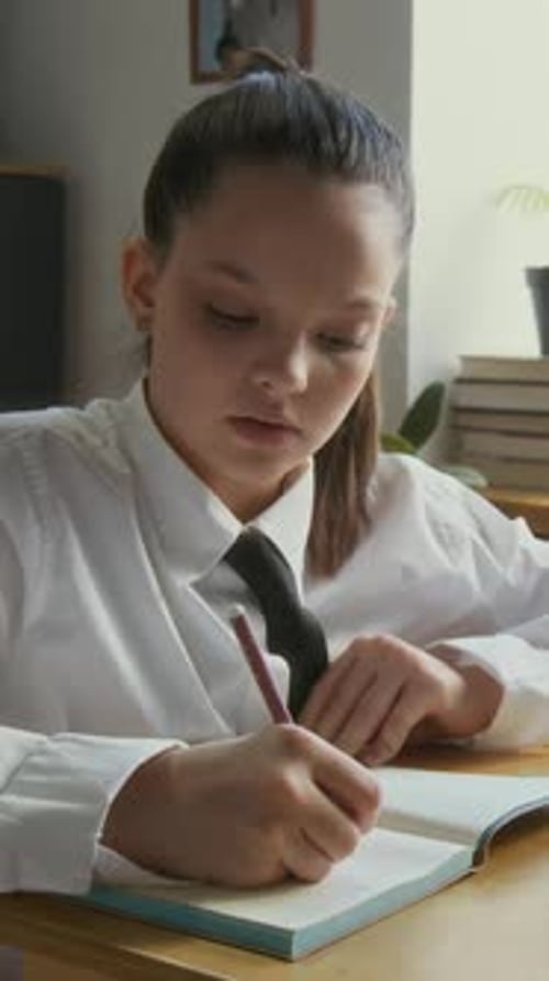 Vertical Portrait of Teen Student Girl at School