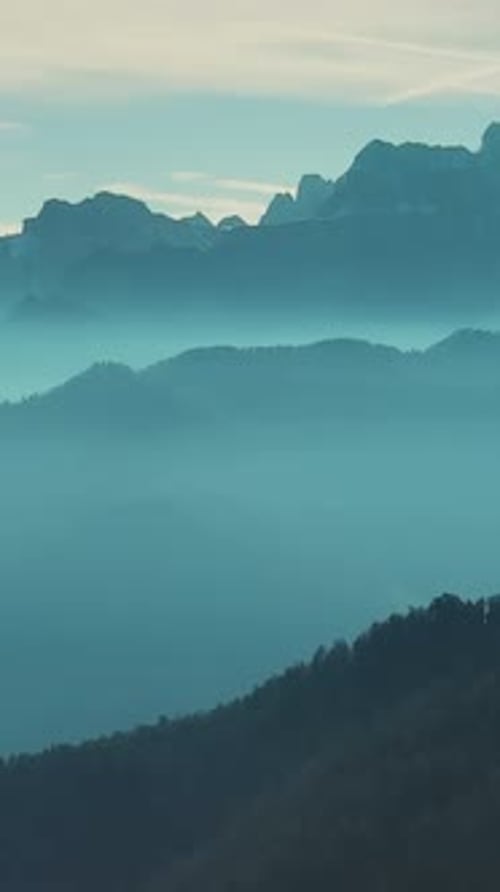 Aerial view of mountains under mist morning