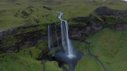 Aerial view of Seljalandsfoss waterfall in Iceland during a cloudy day