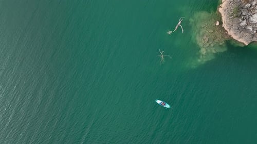 Aerial View People Paddleboarding in the Green Canyon Enjoying Swimming and Summer Fun
