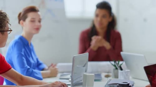 Afro Boss Woman Discussing Business with Colleagues in Modern Office. Multiethnic Team
