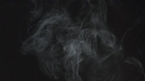 Abstract White Smoke Floating on Black Background