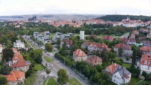 Aerial View From a Drone a Picturesque Cityscape with Colorful Houses and Green Gardens