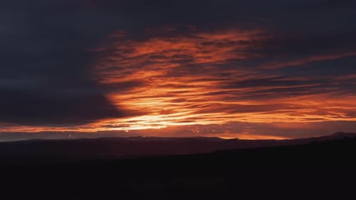 Dramatic Sunrise Over Mountain Range Time-Lapse