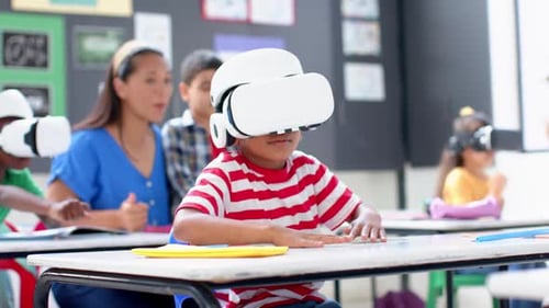 In school, children using VR headsets for interactive learning in classroom