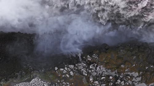 Aerial View of Dettifoss Waterfall with Cascading Torrents in Iceland