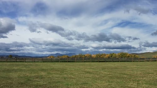 Timelapse of the farmers field with beautiful sky in prairies
