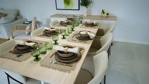 Elegant Modern Dining Area with Styled Table Setting in Luxury Apartment