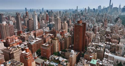 Magnificent cityscape of New York at daytime. Drone footage above the Midtown of metropolis.