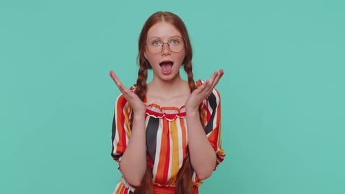 Excited Amazed Girl Surprise Looking at Camera with Big Eyes Shocked By Sudden Victory Wow Emotion