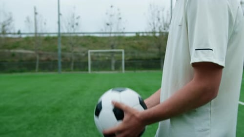 Teenager Hands Move The Soccer Ball