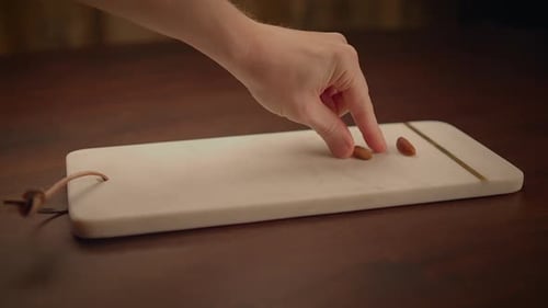 Variety of Nuts Placed on Marble Serving Board