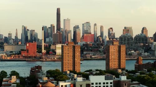 Aerial View of New York City's Hudson River Waterfront During Late Afternoon Highlighting Modern