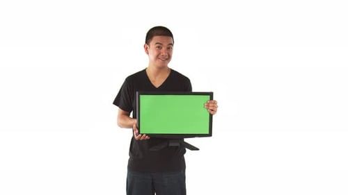 Young Adult Holding Monitor With Green Screen