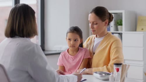 Mother and Daughter Medical Clinic Visit