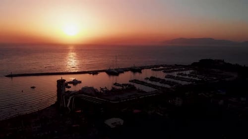 drone view of the beach at sunset