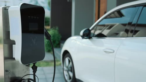 Progressive Concept of Home Charging Station Providing Clean Energy for EV Cars