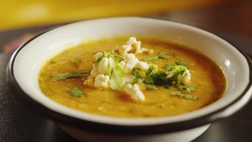 Mexican Vegetarian Vegan Bean Soup in Cooking Plate Bowl Cream Soup in Tex Mex American Restaurant