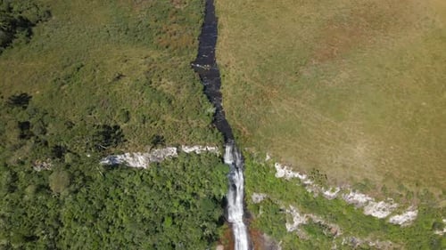 Aerial View Of River Flowing Through The Rio dos Bugres Waterfall During Summer In Urubici, Santa Ca