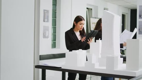 Graphic Artist Developing Architectural 3d Building