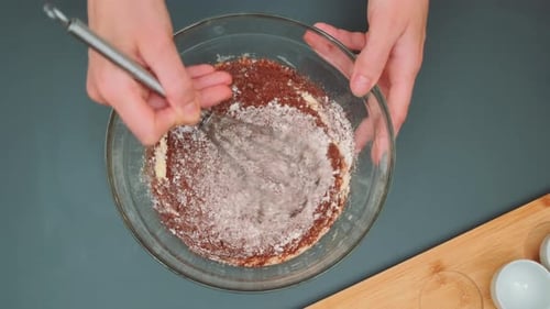 Mixing Dry and Wet Sponge Cake Ingredients