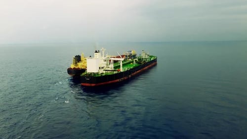 Drone footage of Iranian ship to ship oil tankers transferring oil evading sanctions