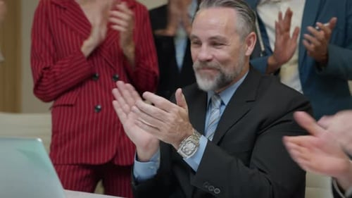 Colleagues Applauding Success in the Workplace