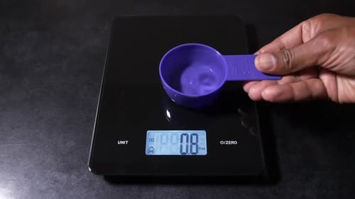 Measuring Cup on Digital Kitchen Scale